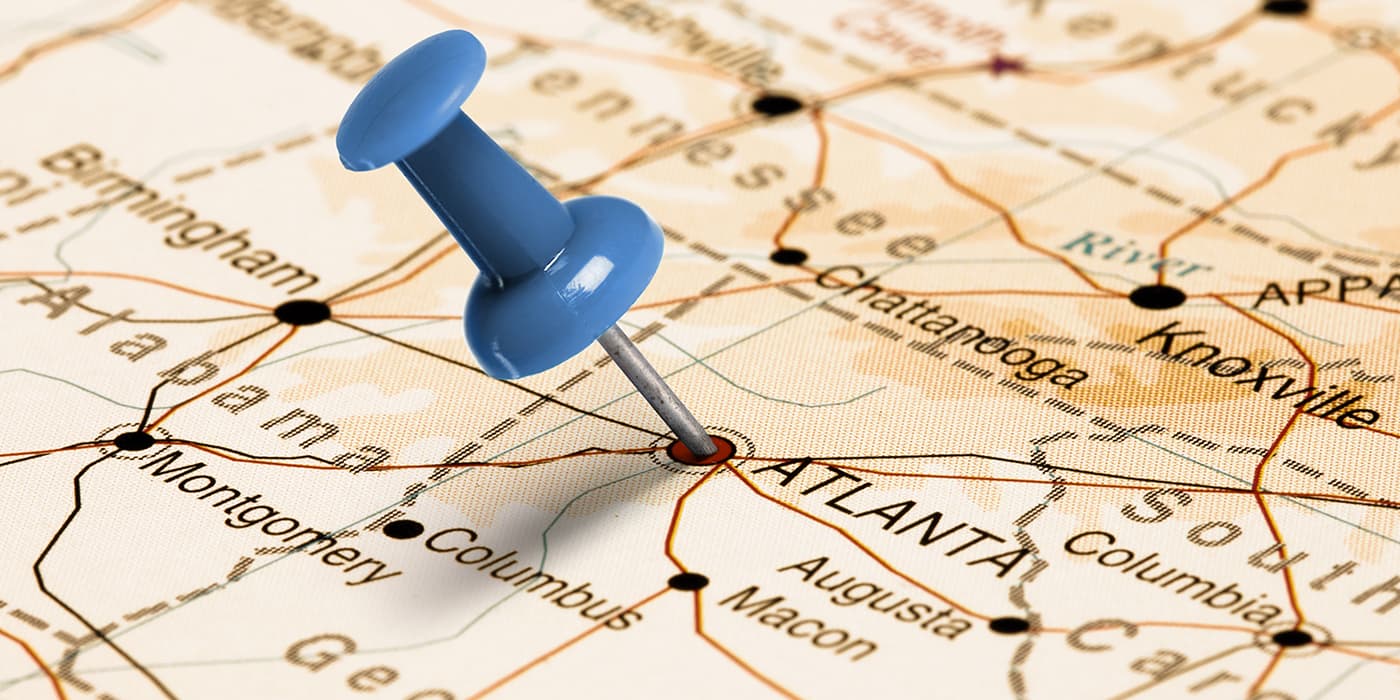 A map of the southeastern United States with a pin on the city of Atlanta, Georgia.